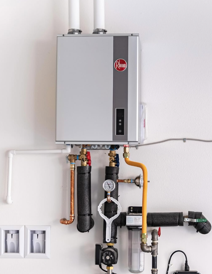 A completed Infinity Plumbing Designs tankless water-heater installation