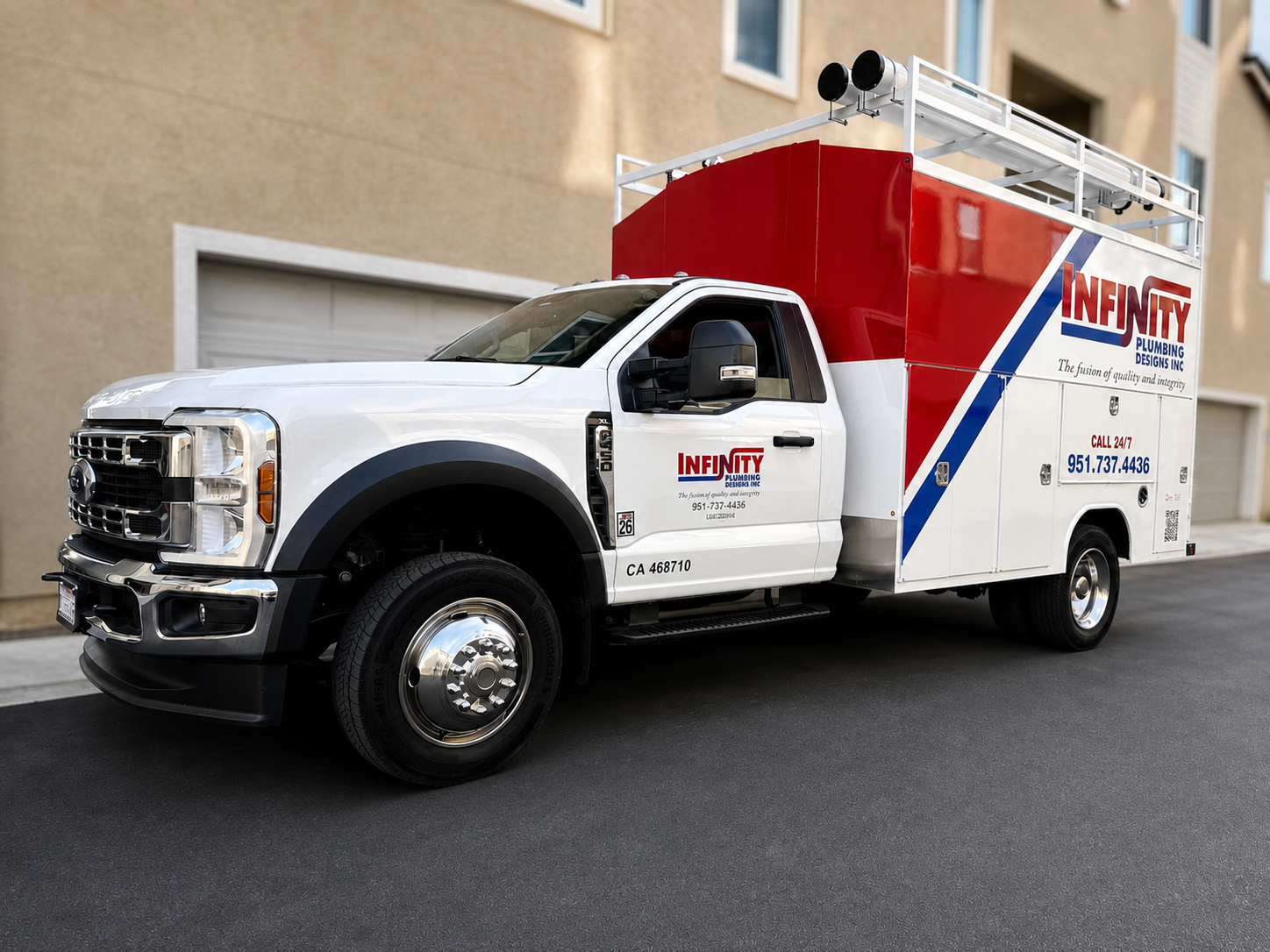 Infinity Plumbing Designs service truck at a Southern California home